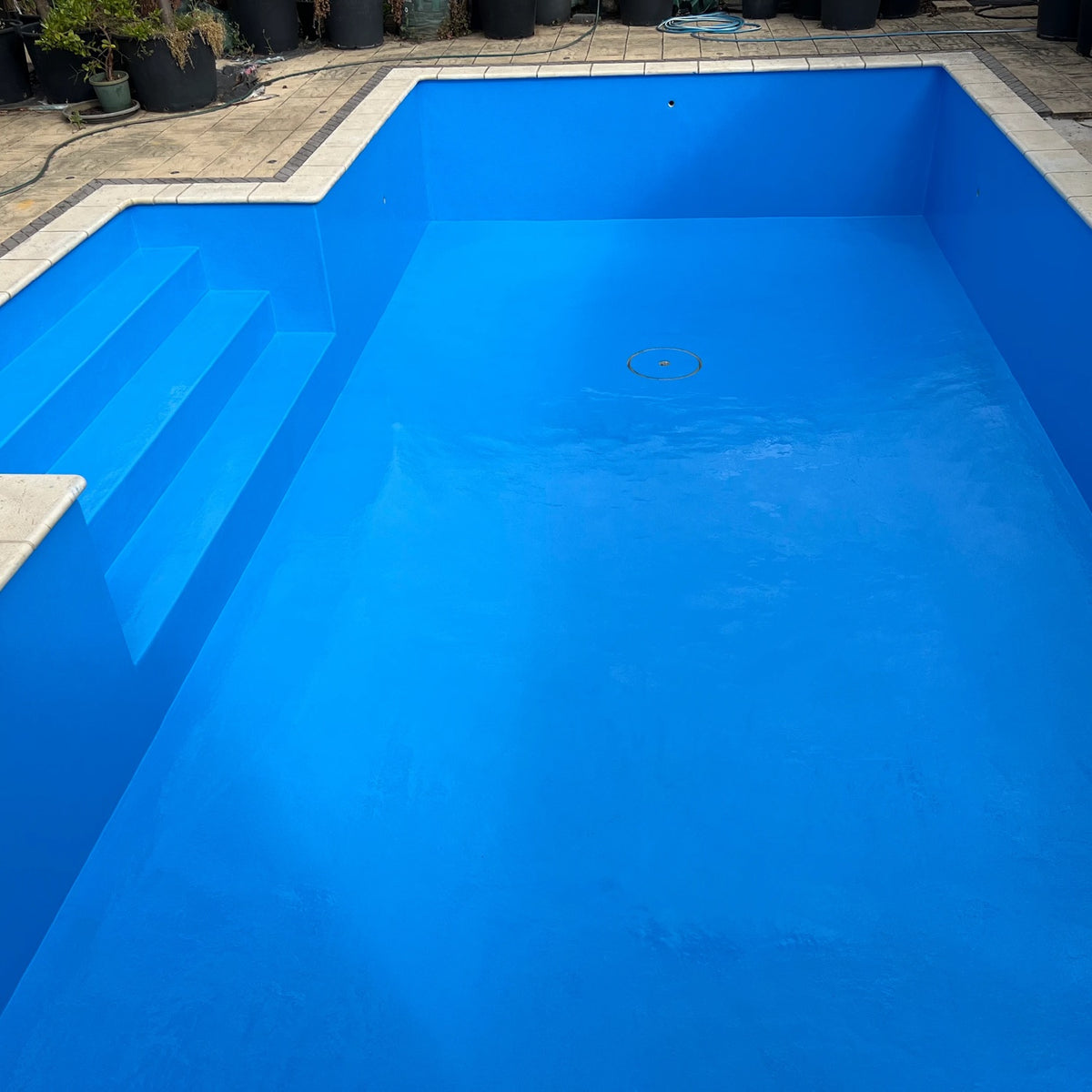 After: the same pool finished in UV Plus Pool Polyaspartic