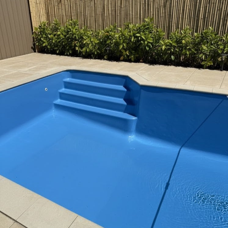 Fibreglass pool and steps recoated in pool polyaspartic